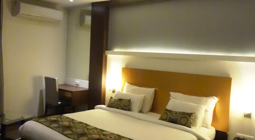 Hotel Galaxy Мумбаи Номер фото